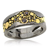 Custom narrow tapered River Pebbles black diamond ring