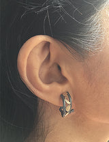 Whirlpool Earrings on ear