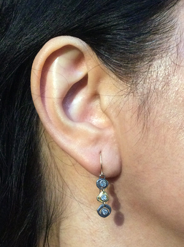 Open Pebble Three Shape Dangle Earrings with diamonds on ear