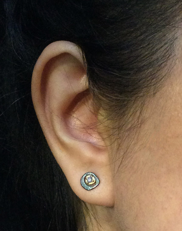 Diamond Pebble Stud Earrings on ear