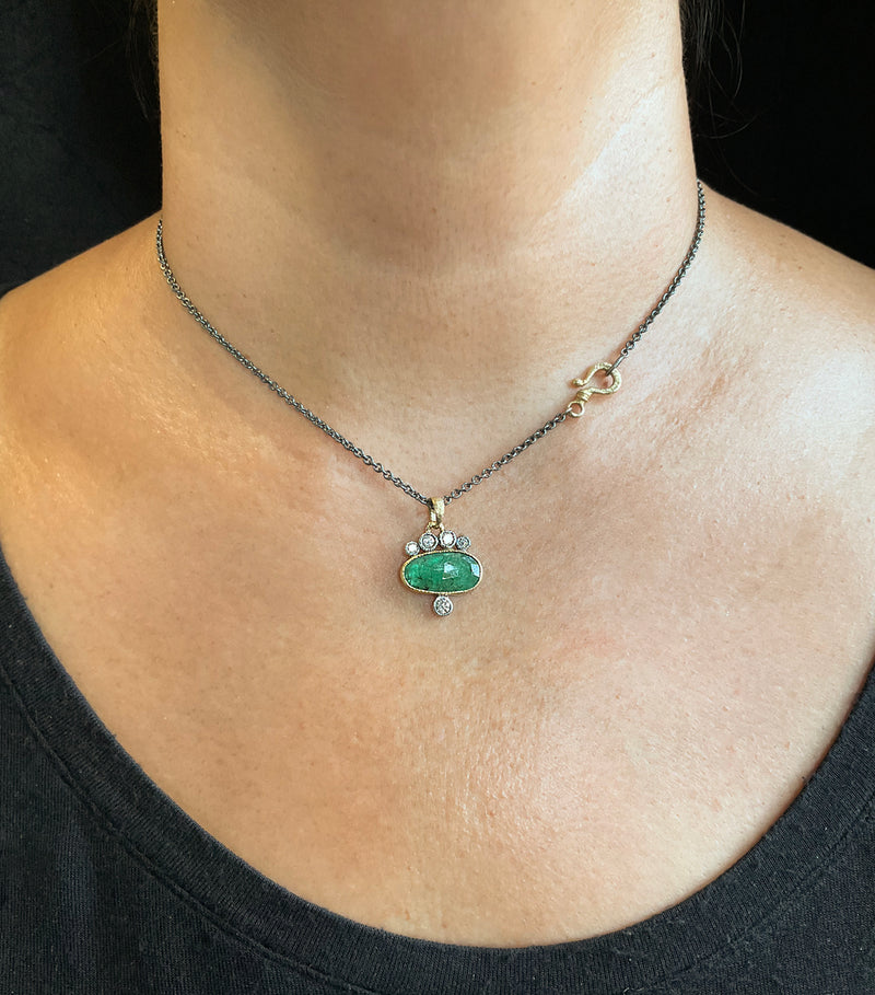 Emerald Pendant Necklace with Diamonds on neck