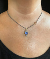 Tanzanite Pendant Necklace with Diamonds on neck