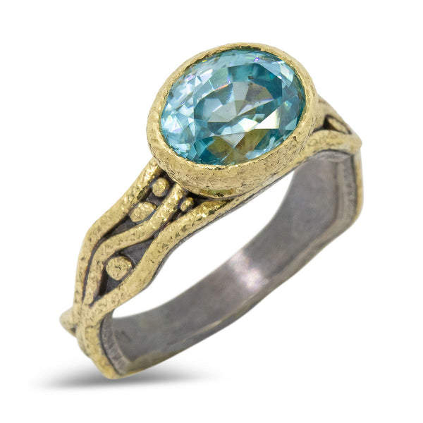 Wavy Watery ring with oval blue zircon