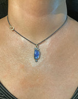 Tanzanite Pendant Necklace with diamonds on neck