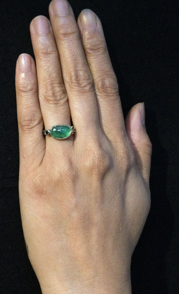 Delicate Double Band Emerald ring with black diamonds on hand