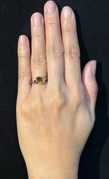 Custom Duo Signet Ring with Pear-Cut Topaz and Ruby  on hand