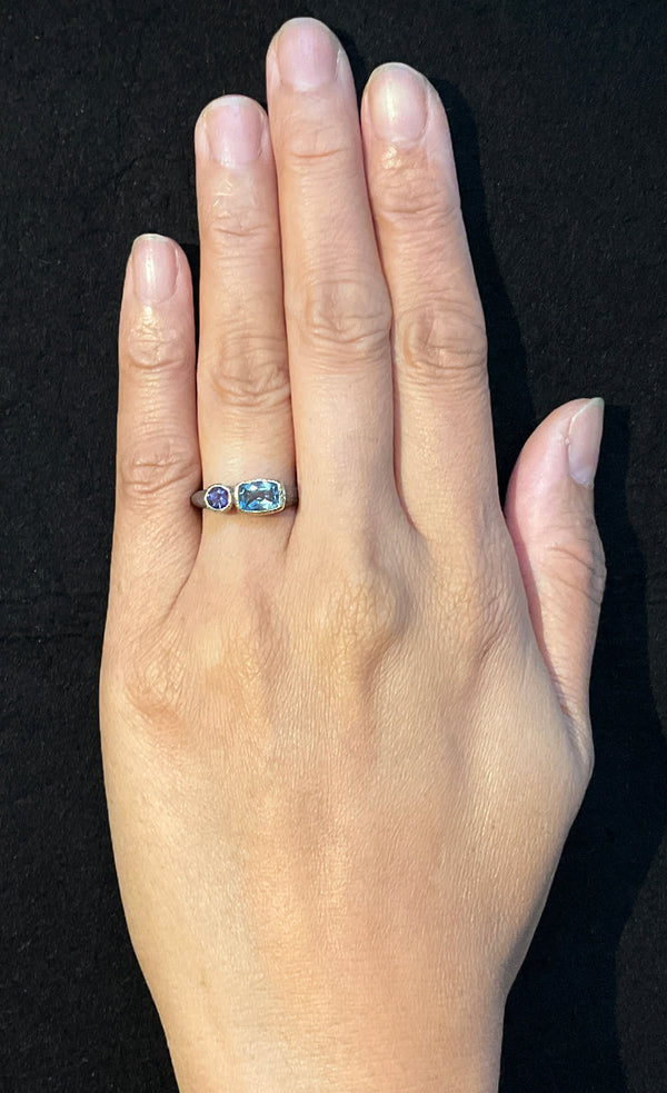 Duo Signet Ring with cushion cut aquamarine and round iolite hand