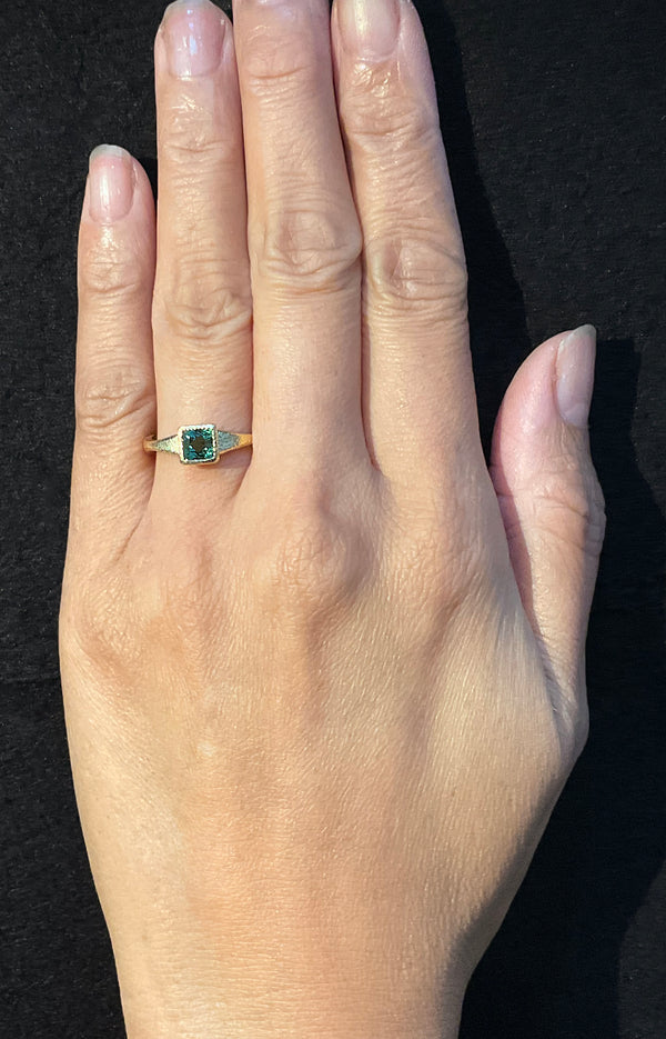 Forged Blue-Green Tourmaline Ring in 18k gold on hand