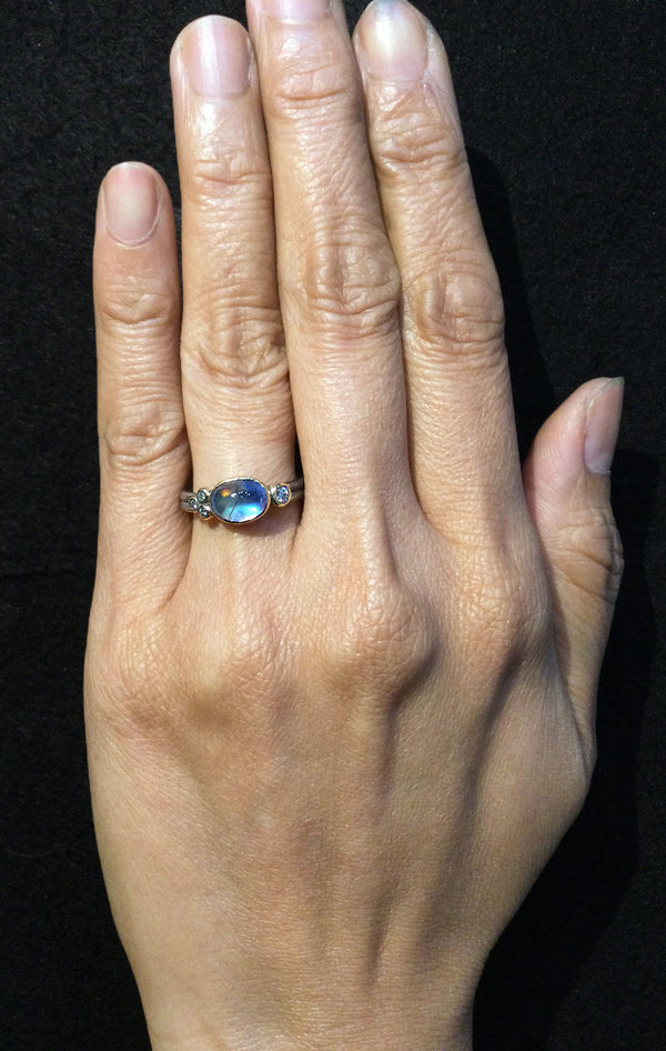 Delicate Double Band with Oval Rainbow Moonstone on hand