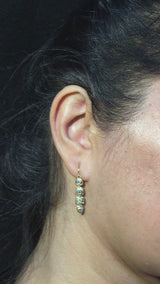 Open Pebble Organic Shape Earrings with white diamonds