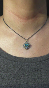 Halo Blue Zircon and Diamond Pendant