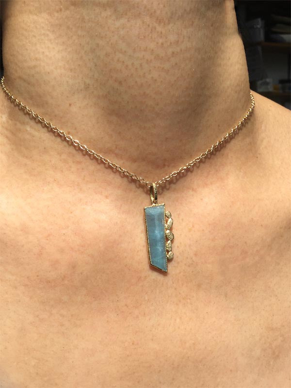 Geo-organic aquamarine vertical pendant on neck