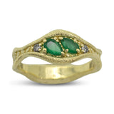Custom Emerald Ring with salt and pepper diamonds in gold.