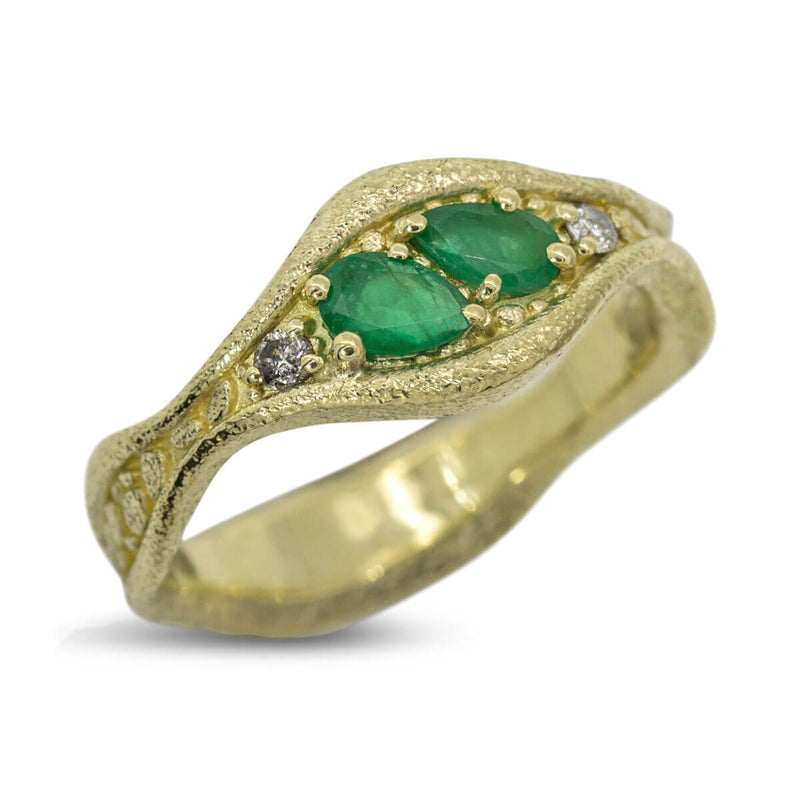 Custom Emerald Ring with salt and pepper diamonds in gold.