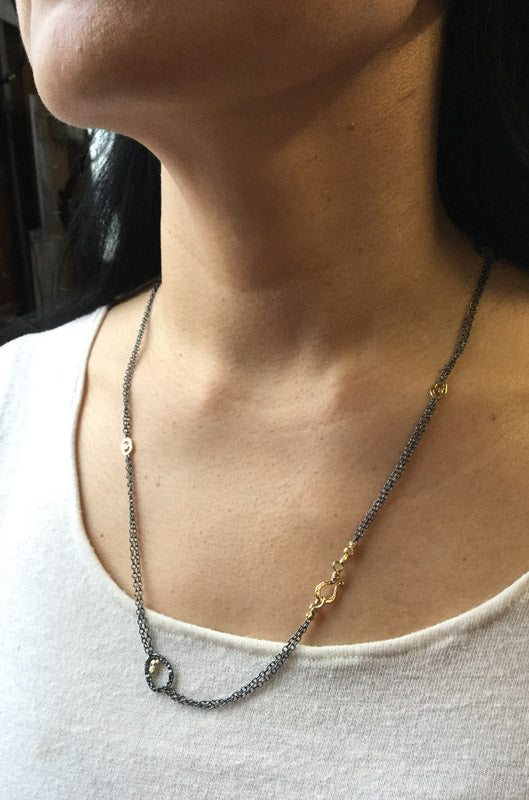 Double chain necklace on neck