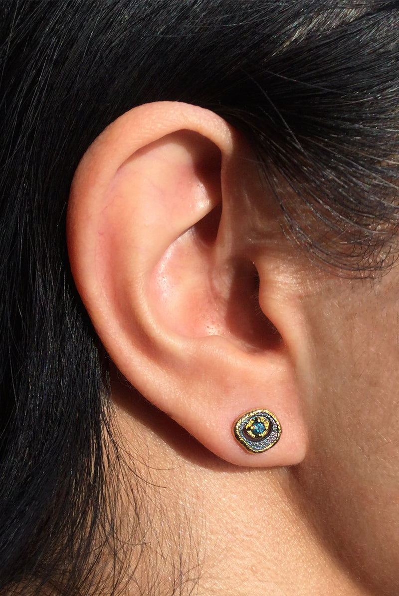Blue Topaz Pebble Stud Earrings ear gold frame