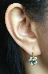 Blue Zircon with white diamonds on ear