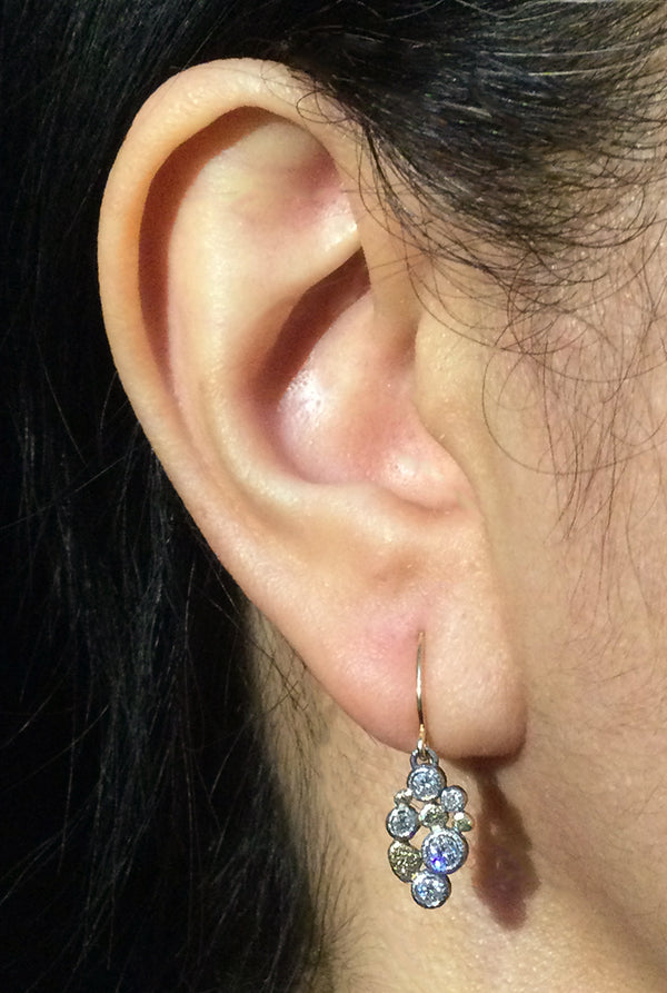Cascading Pebbles Earrings on ear