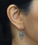 Open Cascading Pebbles Earrings on ear