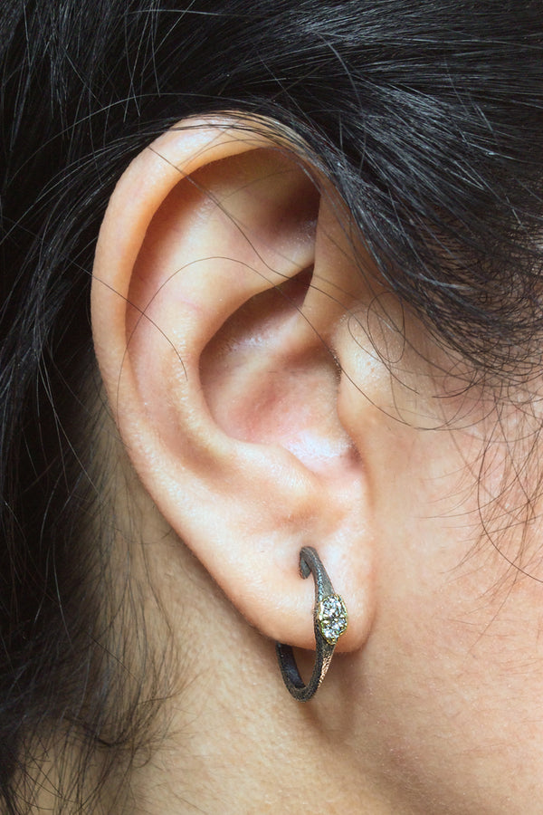 Single Diamond Hoop Earring worn on ear