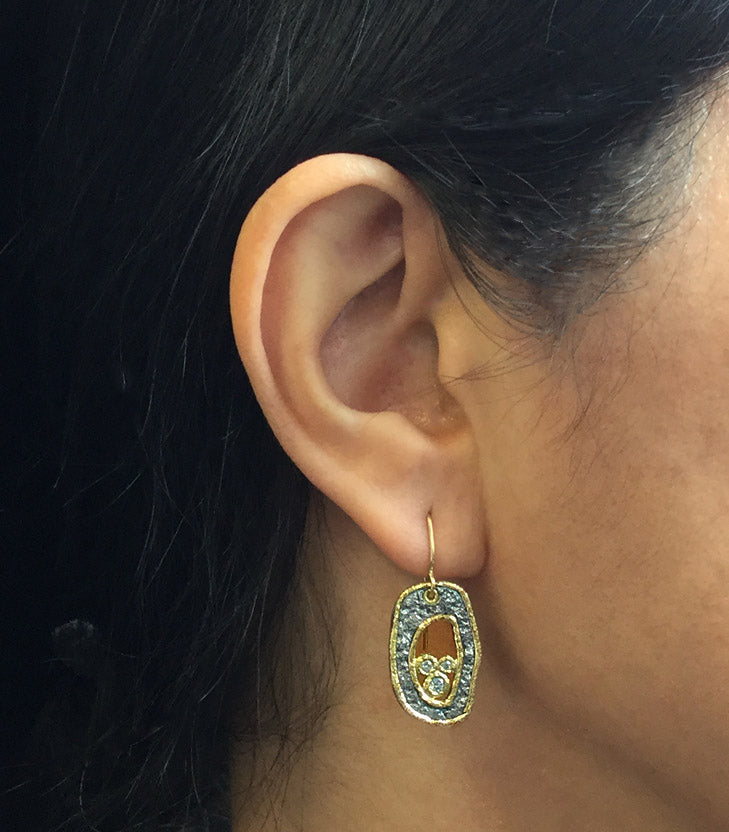 Open Free-form Diamond Pebble Earrings on ear