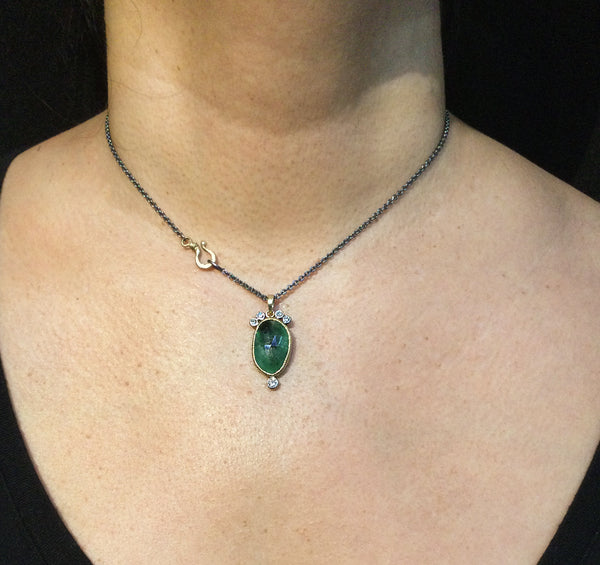 One-of-a-kind-pendant-emarald-neck