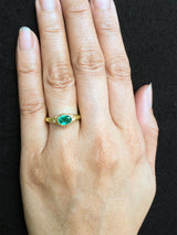 Open Pebbles Emerald Signet Ring on hand