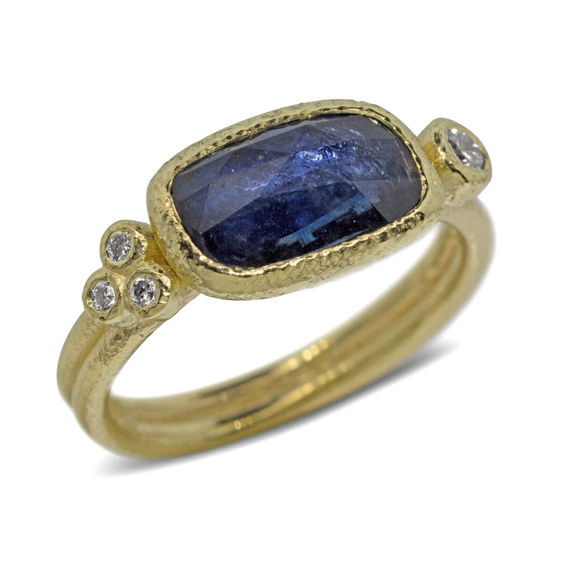 Free form sapphire ring with diamonds