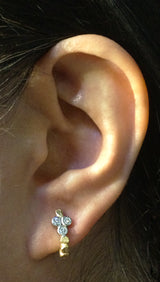 Skinny Pebbles Hinged Hoop earrings on ear
