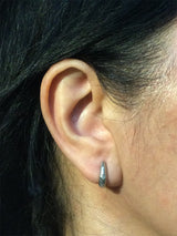 Ancient Hinged Hoop Earrings in 14k White Gold on ear
