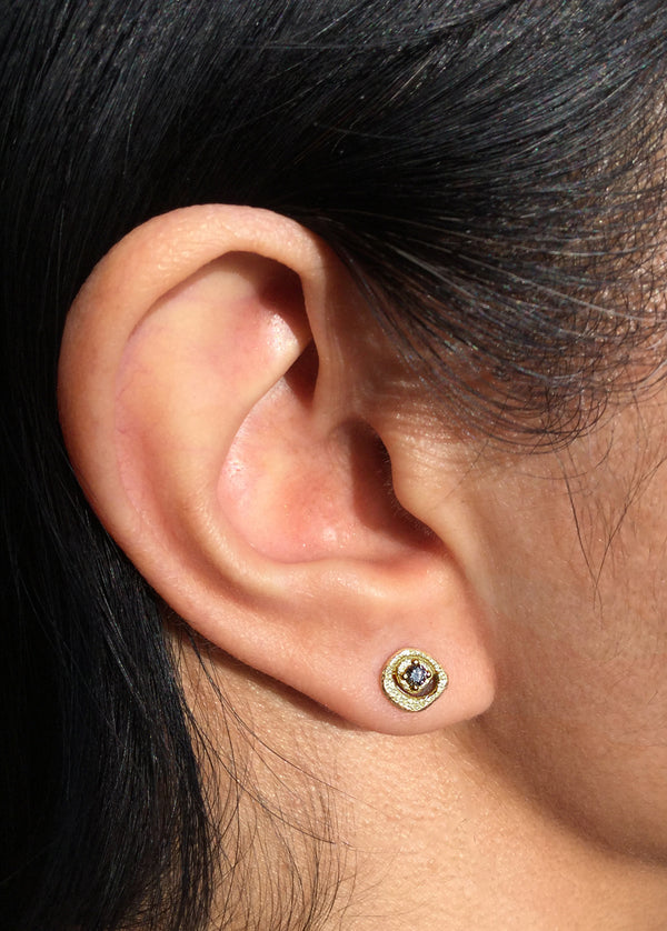 Diamond Pebble Stud Earrings on ear 