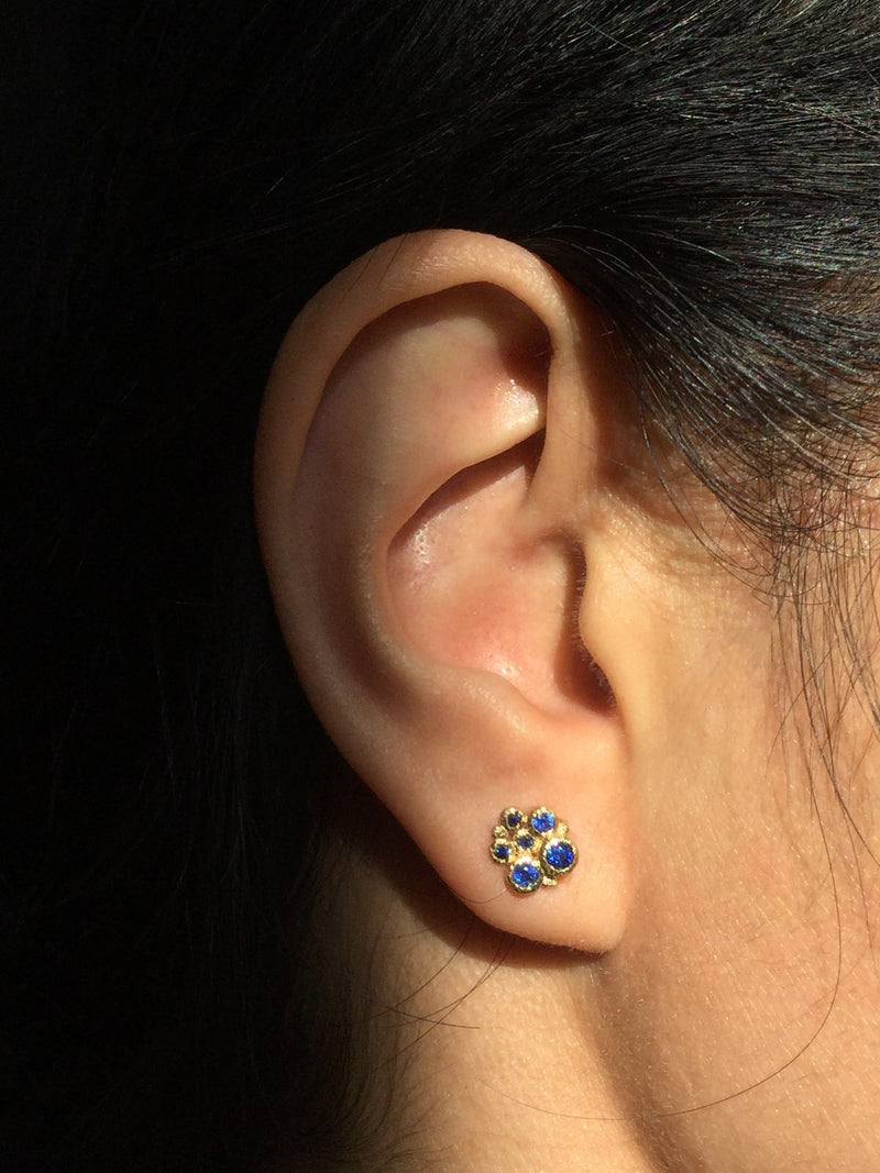 Sapphire Cluster Stud Earrings on ear