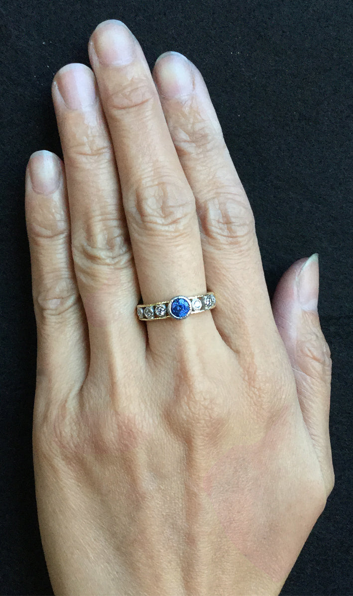 Open Flat Ring with diamonds and sapphire on hand
