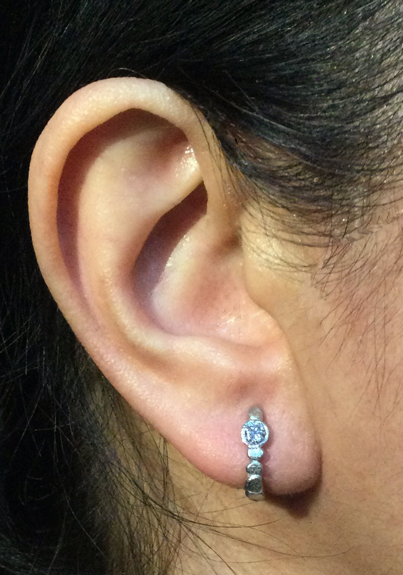 Skinny Pebbles Hinged Hoop Diamond Earrings in 14k white gold on ear
