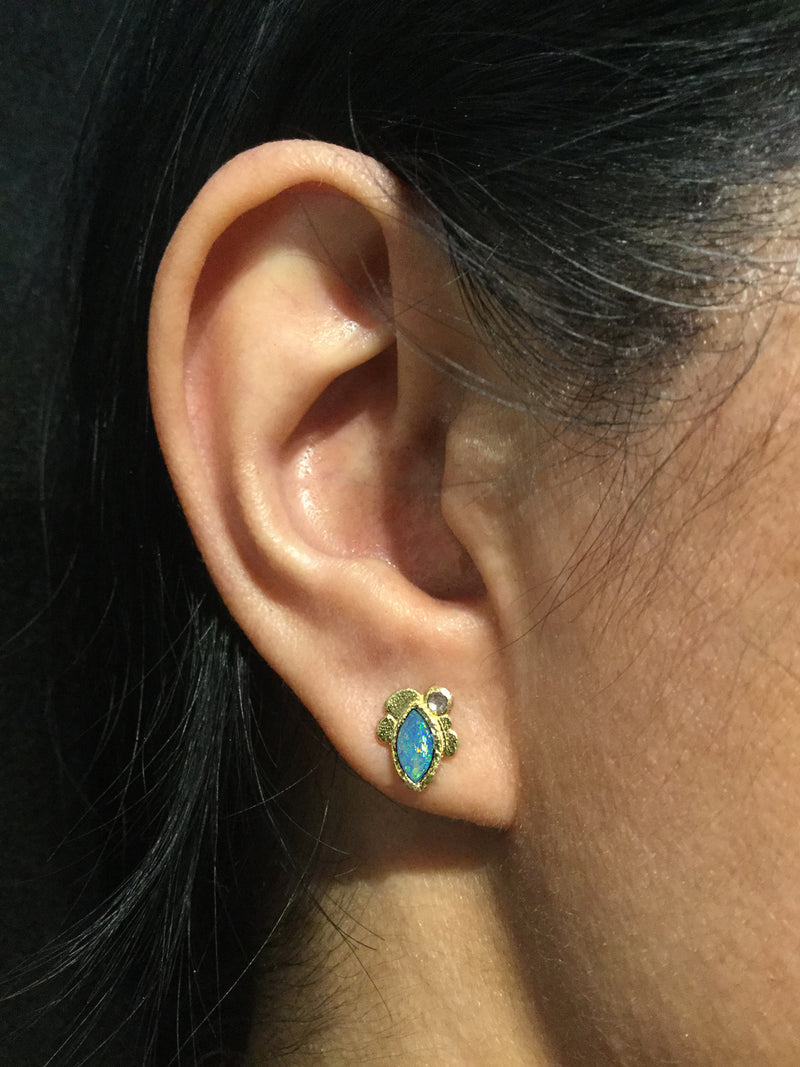 Marquise Opal Stud Earrings on ear 