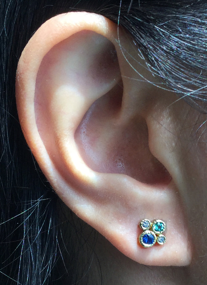 Four Stone Stud Earrings on ear