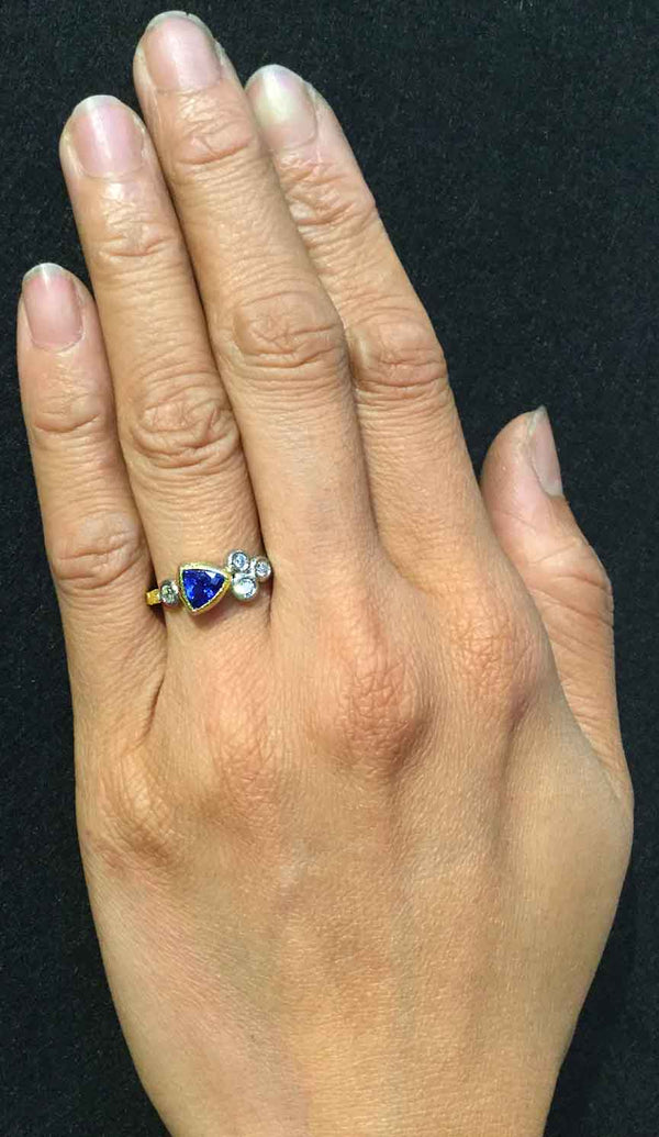 Skinny Pebbles Ring with Trillion Sapphire on hand