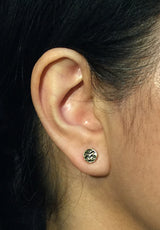 Undulations Gold Stud Earrings on ear